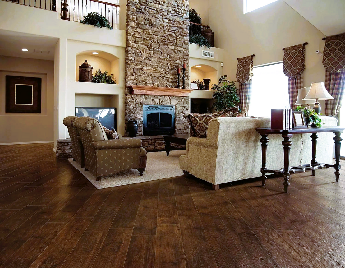 This living room showcases Aspen Burnt Porcelain Wood-look tile.