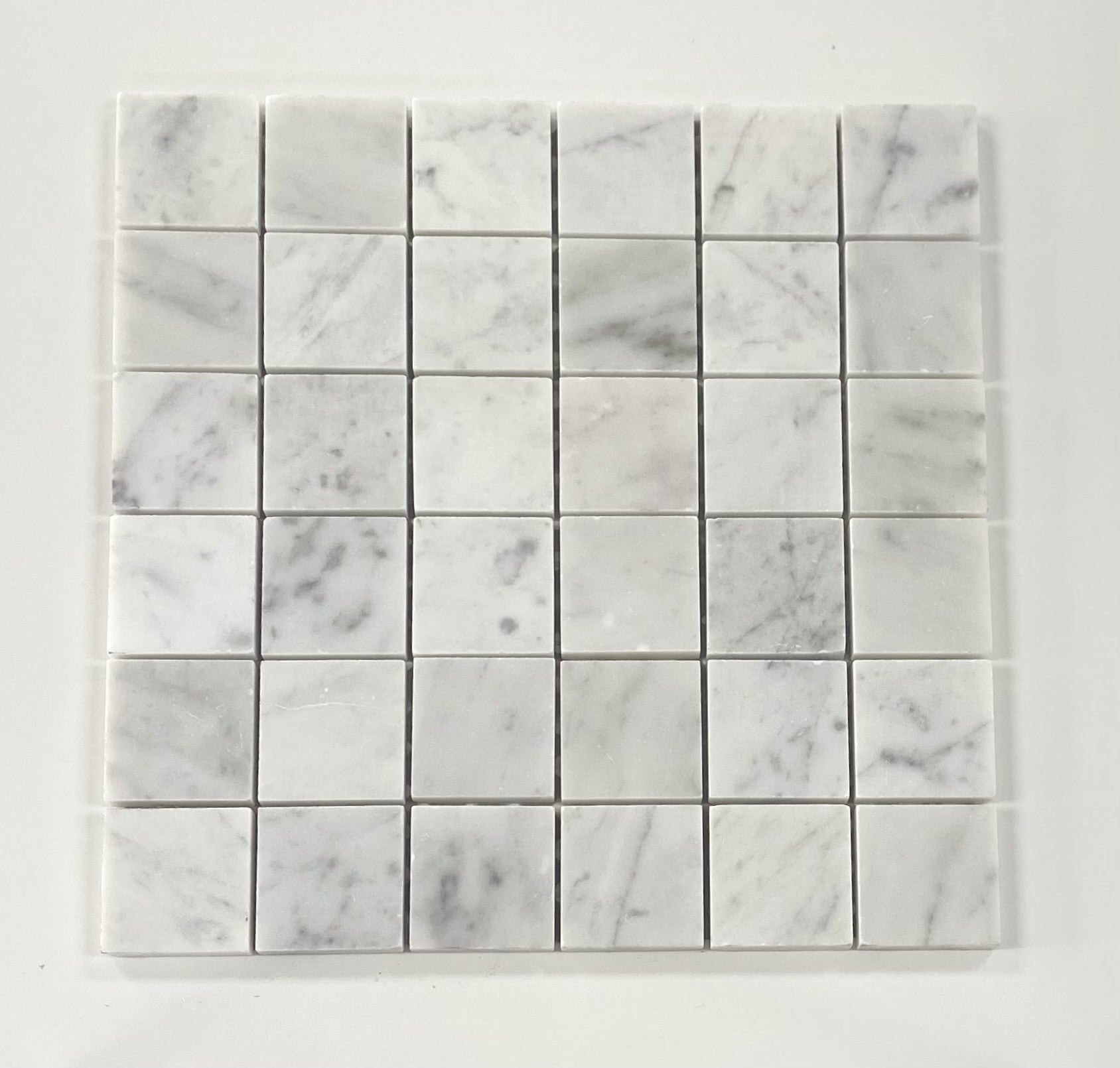 white Carrara 2 x 2 Honed